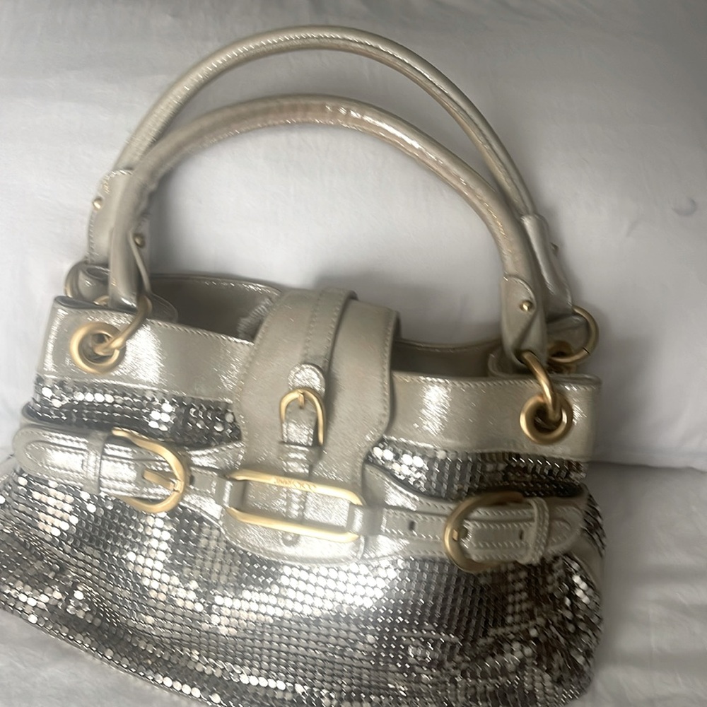 Is a beautiful curse, Jimmy Choo, Brian